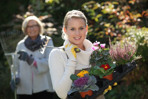 Landscape worker wearing PPE during gardening tasks