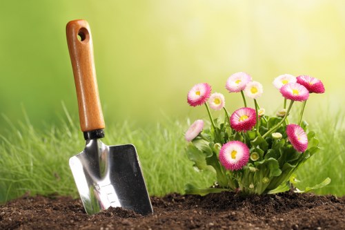 Professional landscaping crew working safely in Chiswick